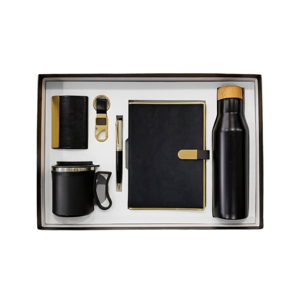 A luxurious black and gold 6-piece corporate gift set, neatly arranged in a white custom-fit insert within a black presentation box, featuring a notebook, pen, card holder, keychain, insulated mug, and water bottle.