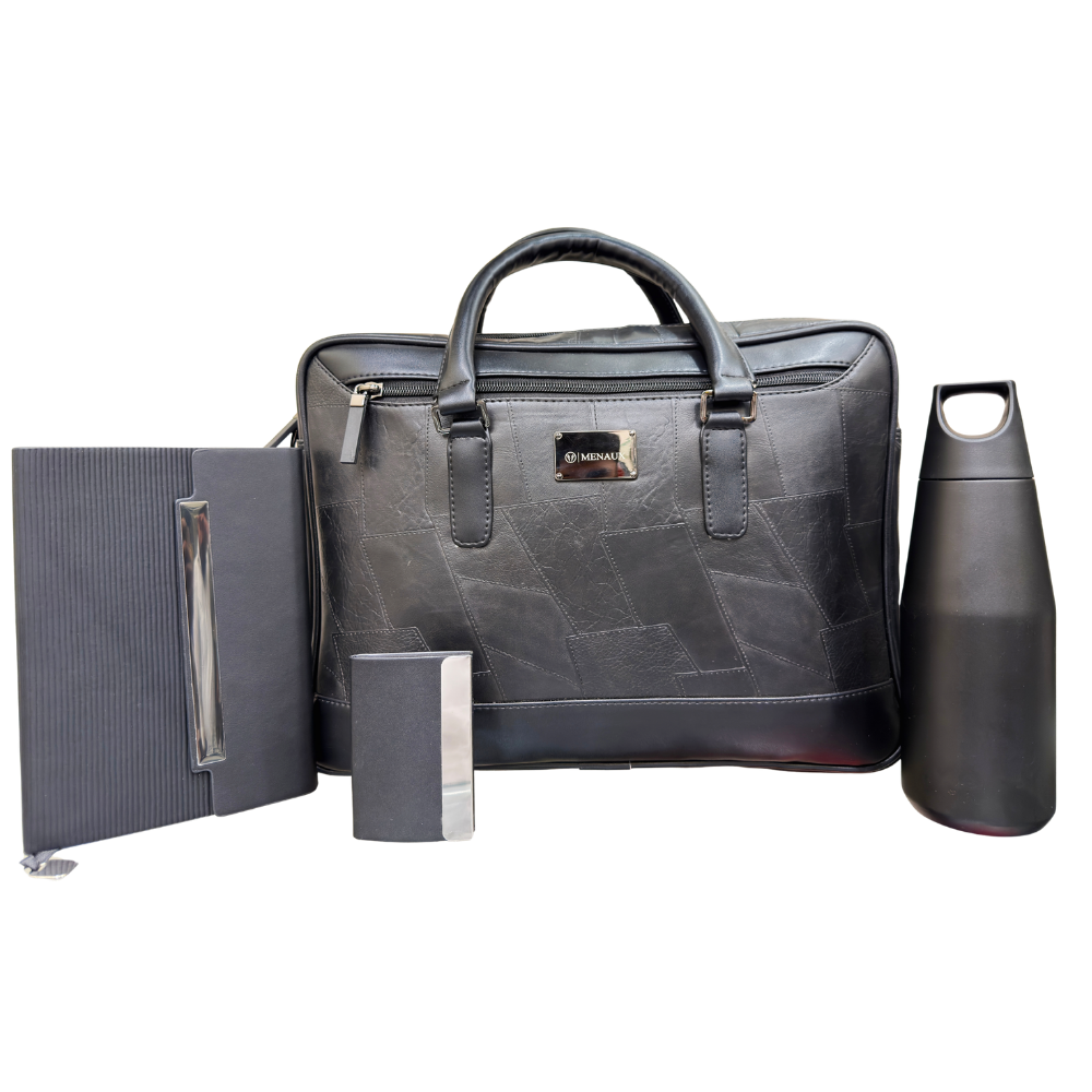 Menaux executive gift set including a black geometric patterned briefcase, notebook, and water bottle.