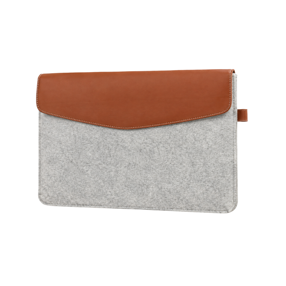 A grey felt laptop sleeve with a brown faux leather flap isolated on a white background.