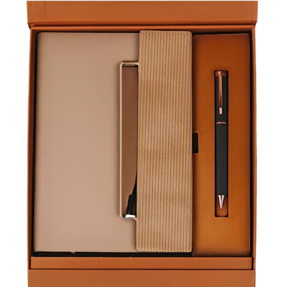 Top-down view of an executive gift set in an orange box, containing a notebook with a ribbed wooden spine and a black pen with rose gold accents.