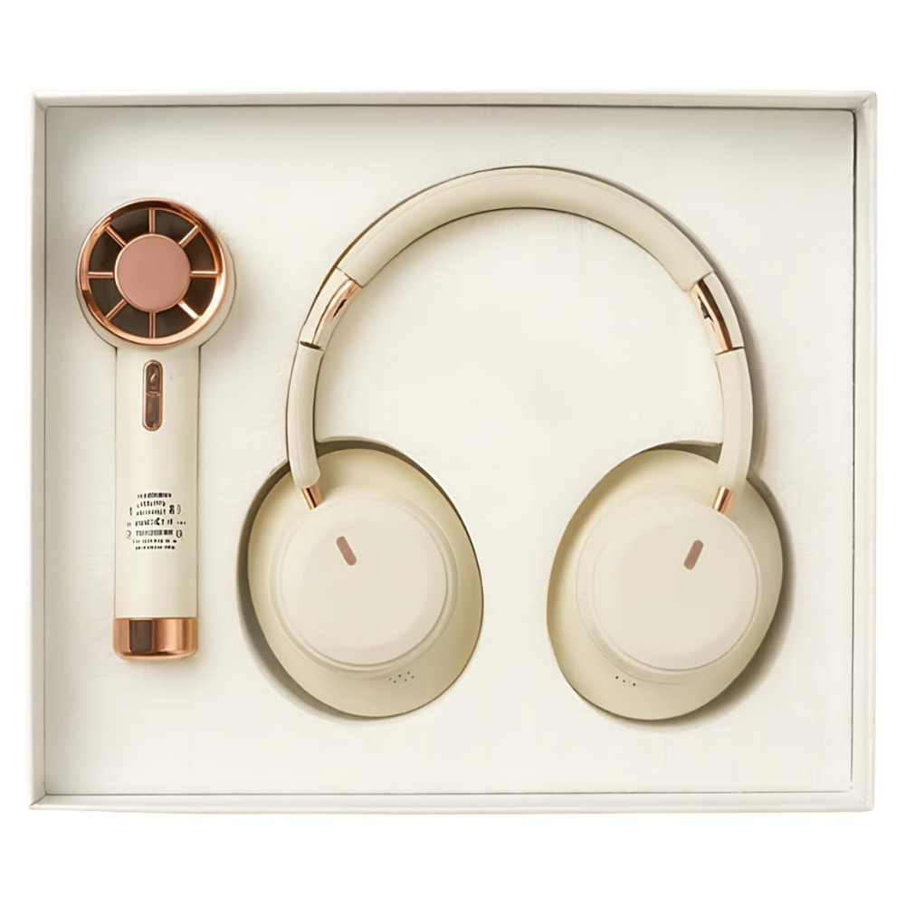 A premium tech gift set in a white box containing a cream-colored handheld fan and wireless headphones with rose gold accents.