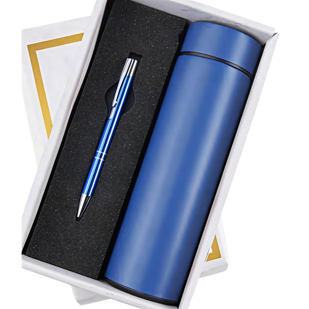 A royal blue vacuum insulated bottle and a matching blue ballpoint pen inside a white gift box with a black foam insert.