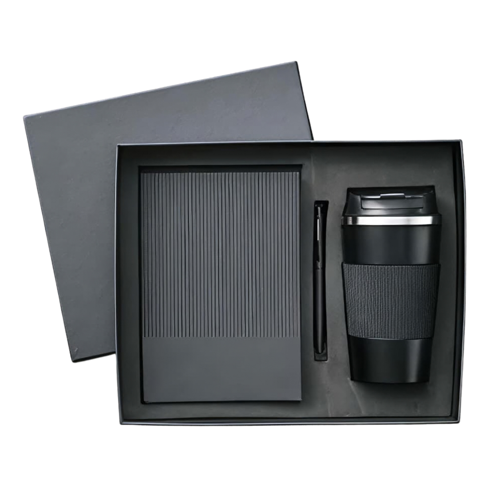 A professional executive gift set in a black box containing a ribbed notebook, a black pen, and a black travel mug.