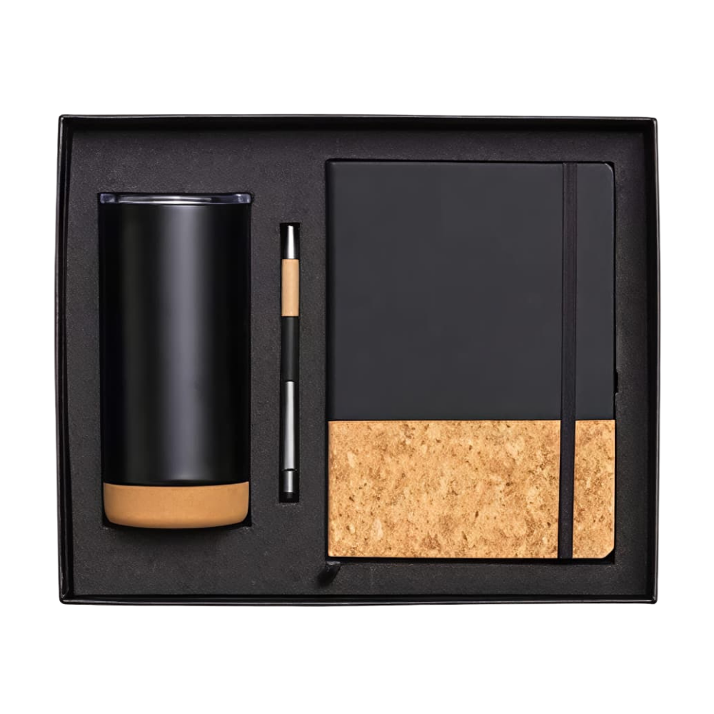 A premium executive gift set in a black box containing a matte black tumbler with a cork base, a matching pen, and a black and cork notebook.