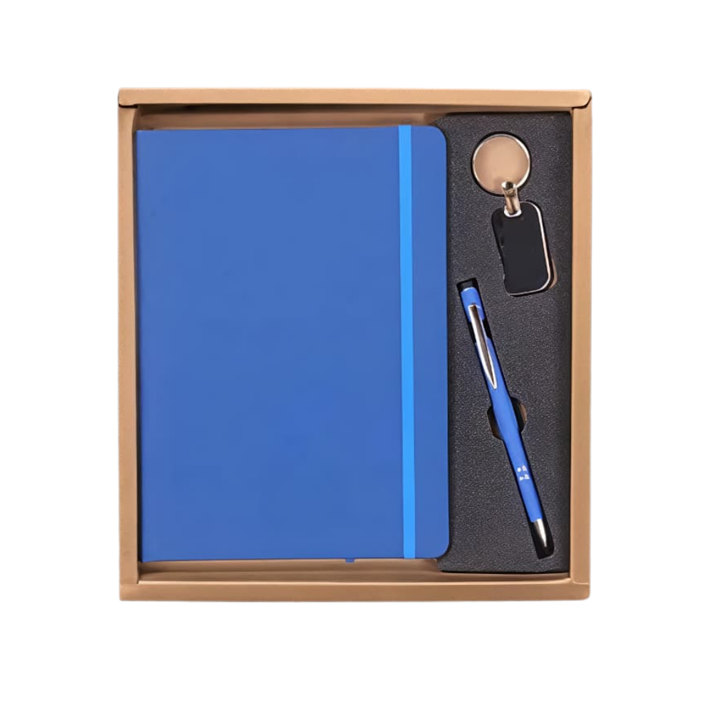 A royal blue executive gift set containing a notebook, pen, and keychain inside a brown cardboard presentation box.