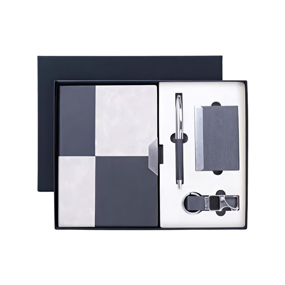 A professional executive gift set in a dark grey box containing a dual-tone notebook, a silver and grey metal pen, and a matching business card holder.