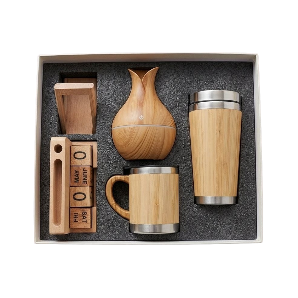 Top-down view of an eco-friendly bamboo office and wellness gift set in a white box.