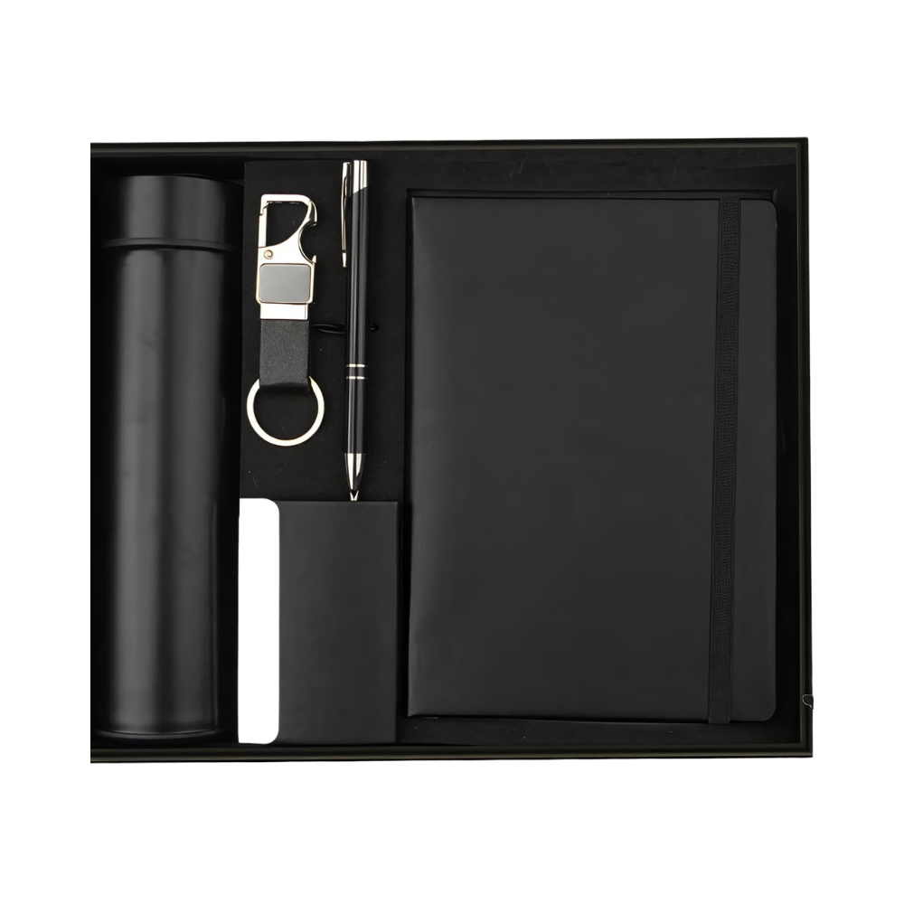 A black executive gift set containing a vacuum bottle, notebook, pen, and keychain in a presentation box.
