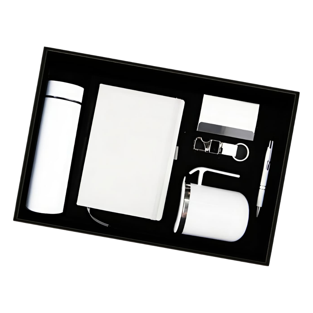 A premium white corporate gift set in a black box containing a bottle, notebook, mug, pen, and keychain.