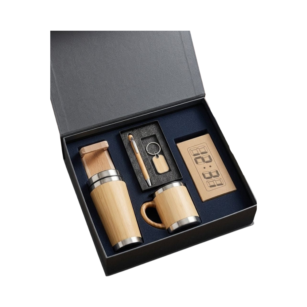 A premium corporate gift set featuring bamboo-wrapped drinkware, a pen, a keychain, and a digital clock inside a dark grey presentation box.